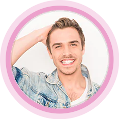 man with full hair smiling