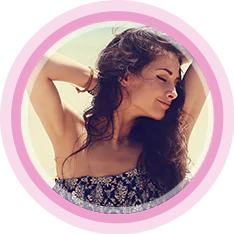woman relaxed with her arms behind her head